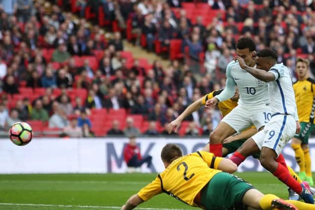 England's Jermain Defoe scores his side's opening goal against Lithuania at Wembley (Picture: Nick Potts/PA Wire).