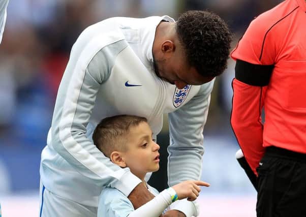 England's Jermain Defoe with mascot Bradley Lowery during the World Cup Qualifying match at Wembley Stadium, London. (Picture: Adam Davy/PA Wire)