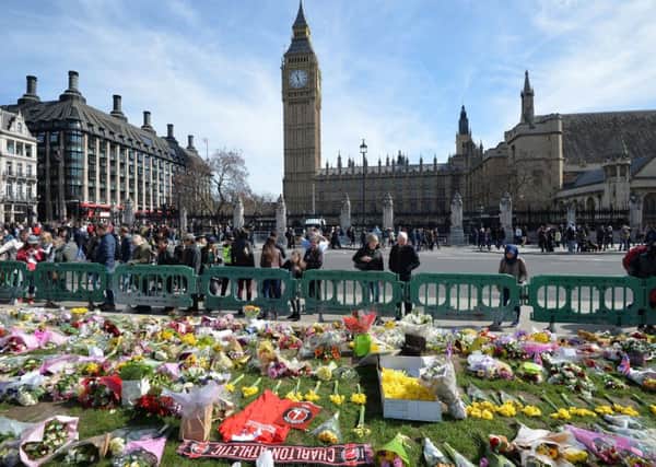 Floral tributes outside Parliament.