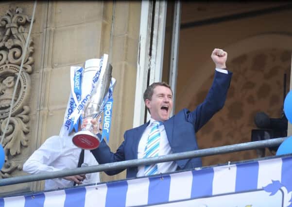 Huddersfield Town chairman Dean Hoyle celebrating promotion to the Championship in 2012  at the Town Hall (Picture: James Hardisty).
