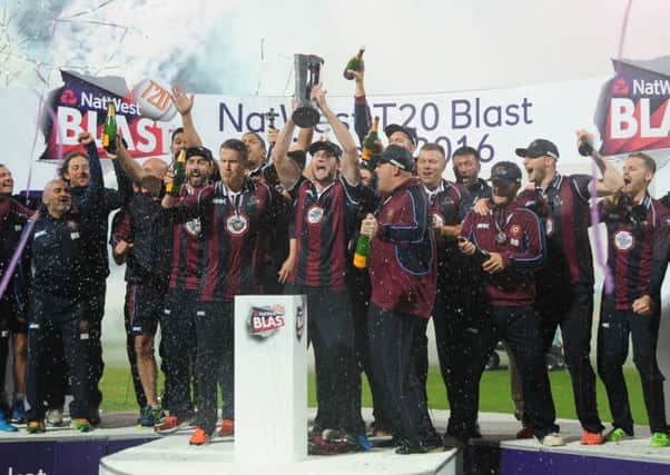 Northamptonshire Steelbacks players celebrate with the trophy after winning the T20 Final.