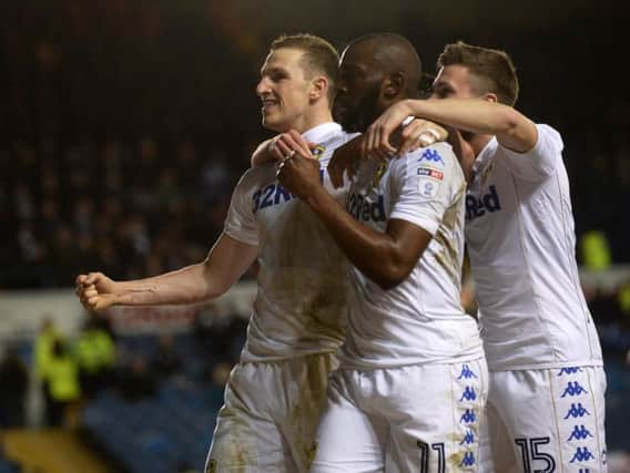 Chris Wood celebrates scoring against Brighton in Leeds' last fixture