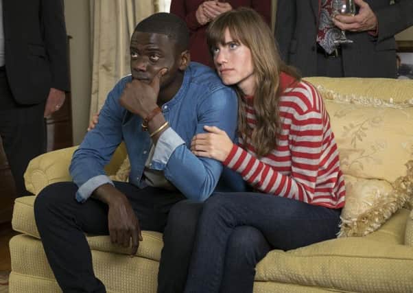Daniel Kaluuya as Chris and Allison Williams as Rose in Get Out.
