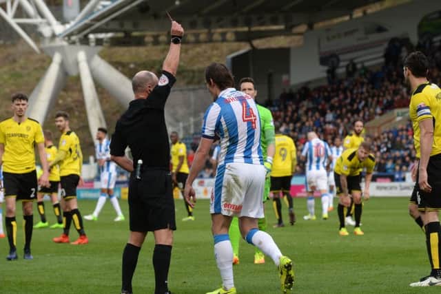 ON YOUR WAY: Dean Whitehead is shown the red card by referee Scott Duncan. Picture: Bruce Rollinson