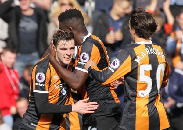 Andrew Robertson is congratulated after scoring Hull City's equaliser in their home win over West ham United (Picture: Richard Sellers/PA).