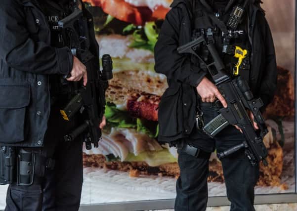 Should there be more armed police on patrol?