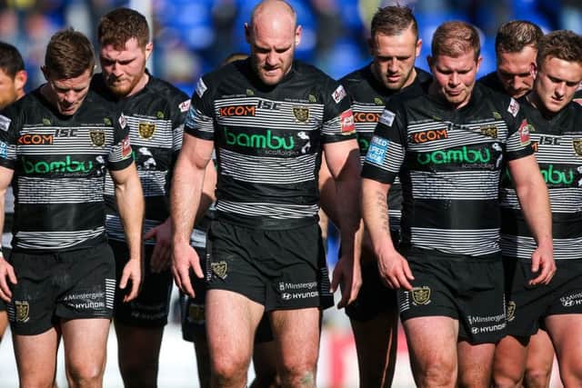 Hull FC players look dejected after letting slip their lead to draw the game. Captain Gareth Ellis (centre). Picture by Alex Whitehead/SWpix.com