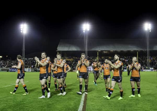 Castleford celebrate victory over Huddersfield to their fans. Picture: Allan McKenzie/SWpix.com