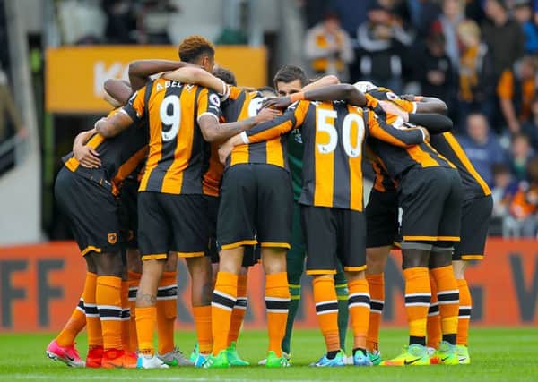 Hull City players get in a huddle as they plot a way to Saturdays 2-1 victory against West Ham (Picture: Richard Sellers/PA).