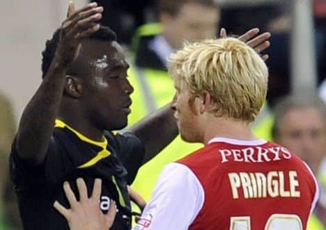 Wednesday's Jermaine Johnson clashes with Millers' Ben Pringle before being sent off