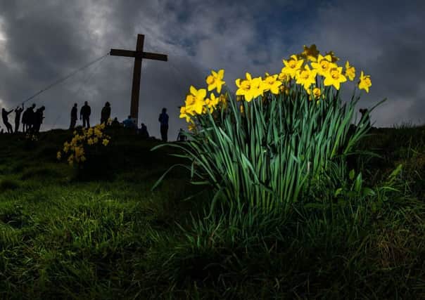 The rising of the Easter Cross at Suprise View, at Oltley Chevin, by members of Otley council, members of local Christian churches, residents and volunteers. For Christians, Easter without God is an empty shell.