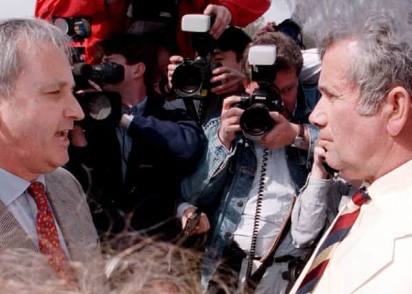Martin Bell meets Neil Hamilton on the election campaign trail in 1997. (PA).