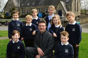 Andrew Phoenix , headteacher of Hampsthwaite Primary School, near Harrogate, with pupils.
 
Picture Jonathan Gawthorpe.