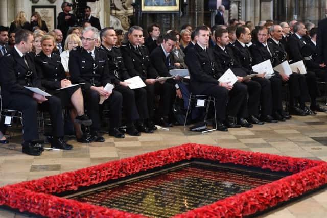 Metropolitan Police officers attend the Service of Hope at Westminster Abbey in London, following the Westminster terror attack. PRESS ASSOCIATION Photo. Picture date: Wednesday April 5, 2017. See PA story POLICE Westminster. Photo credit should read: Eddie Mulholland/The Daily Telegraph/PA Wire