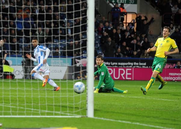 Huddersfield's Elias Kachunga scores for Town. (Picture: Tony Johnson)
