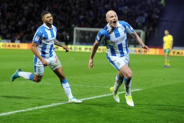 Huddersfield's Aaron Mooy celebrates his goal, Town's second, with Nahki Wells. (Picture: Tony Johnson)