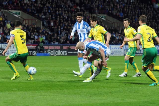 Huddersfield's Aaron Mooy fires in his goal. (Picture: Tony Johnson)