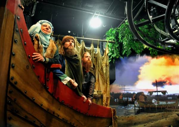Actors  on board a Viking boat  in  Jorvik, which reopens to the public on Saturday.