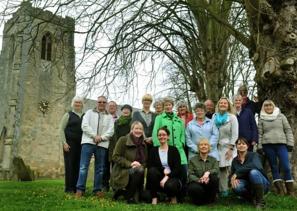 Members of the Kilham choir by the village church.