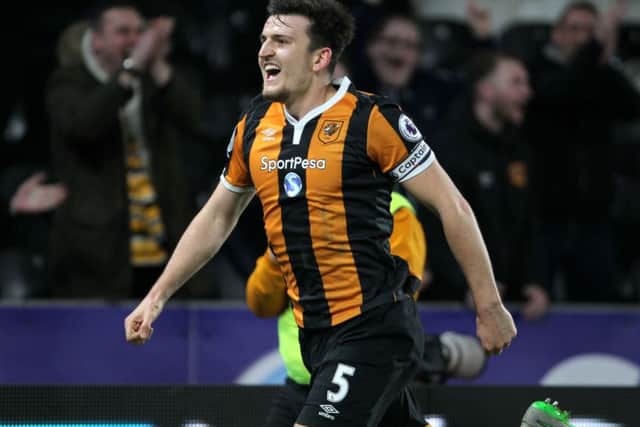 Hull City's Harry Maguire celebrates scoring his side's fourth goal against Middlesbrough, his first for the club in the Premier League. (Picture: PA).