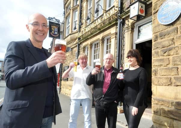 6 April 2017.......   Chris Hill with John Heany, Jim Brettell and  Finley honeyball, from the  Cardigan Arms Community Pub Campaign outside the alehouse on Kirkstall Road.  A group of locals hope to buy historic Leeds pub the Cardigan Arms so its future is secured under community ownership. A community share offer is to  be launched tonight (Thurs) and campaigners are hoping the 200 locals who have joinbed the campaign tpo save the pub will invest.. Picture Tony Johnson.