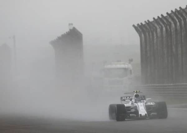 Williams driver Lance Stroll of Canada steers his car during the first practice session for the Chinese Formula One Grand Prix at the Shanghai International Circuit in Shanghai, China. (AP Photo/Andy Wong)