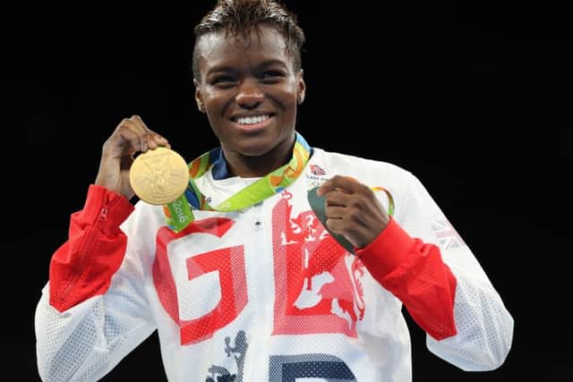 Great Britain's Nicola Adams with her gold medal following victory over France's Sarah Ourahmoune in Rio (Picture: PA)