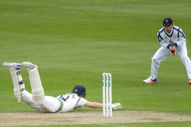 Yorkshire's Peter Handscomb dives to avoid being run out against Hampshire on day one (Picture: SWPix.com)
