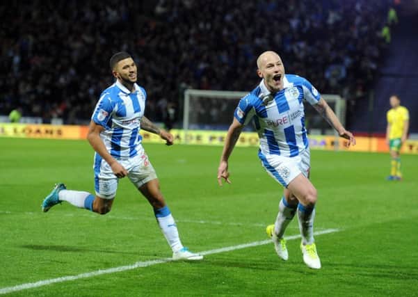 STAR TURN: Huddersfield Town's Aaron Mooy celebrates his goal against Norwich City on Wednesday with Nahki Wells. Picture: Tony Johnson.