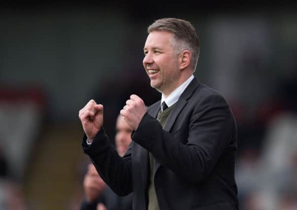 Doncaster Rovers manager Darren Ferguson celebrates his sides' fifth goal against Grimsby last Saturday Picture: Jon Buckle/PA