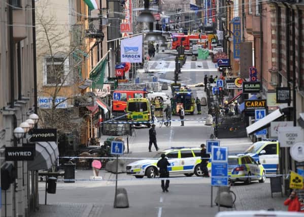 A view of the scene after a truck crashed into a department store injuring several people in central Stockholm, Sweden, on Friday. Picture: Fredrik Sandberg/TT News Agency via AP)