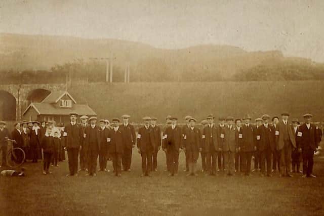 August 1914: young men from the western Dales assembling on Settle cricket ground to enlist for service in World War I.