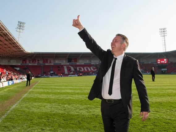 Darren Ferguson salutes the Doncaster faithful at the Keepmoat Stadium (Photo: PA)