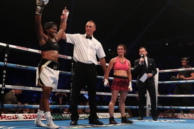 Nicola Adams (left) celebrates after beating Virginia Noemi Carcamo in the International Flyweight Contest at Manchester Arena (Photo: PA)