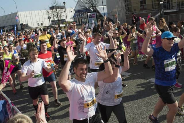 Runners hit the pavement for the Yorkshire Half Marathon today. Pics: Dean Atkins