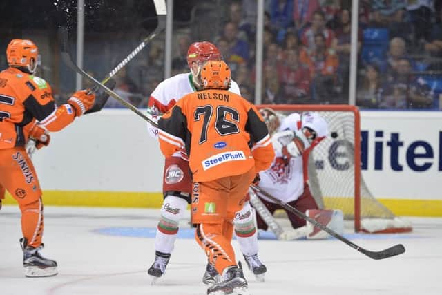 MAGIC MOMENT: Levi Nelson's (No 76) shot flies past Ben Bowns' left shoulder to bring victory in second overtime period for Sheffield Steelers in the Elite League play-off final. Picture: Dean Woolley.