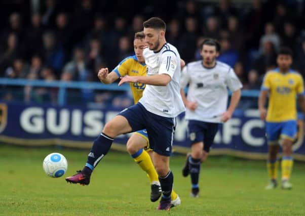 SEEING RED: Guiseley's Jake Cassidy. Picture: Tony Johnson.