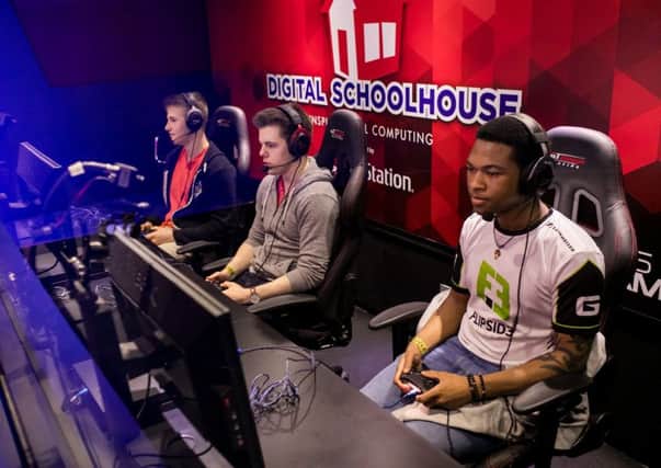 IN CONTROL: Students compete in the eSports Grand Final.