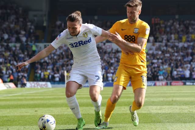Luke Ayling holds off Paul Gallagher during Leeds United's defeat of Preston NE. (Picture: Bruce Rollinson)