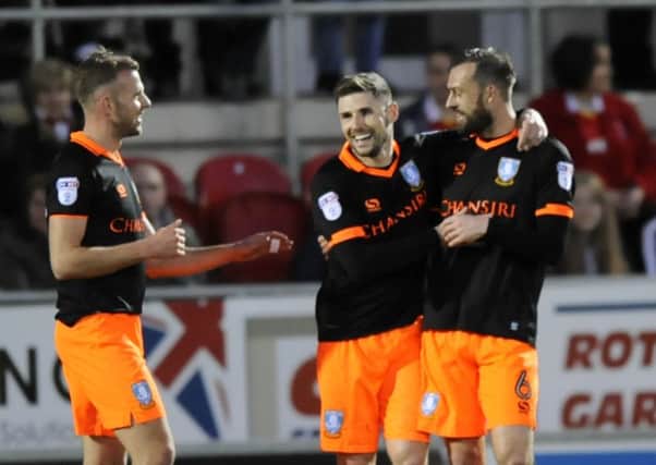 Steven Fletcher, right, Gary Hooper, and Justin Rhodes, left, are just three of the strikers available for Sheffield Wednesday in the race for the play-offs (Picture: Steve Ellis).