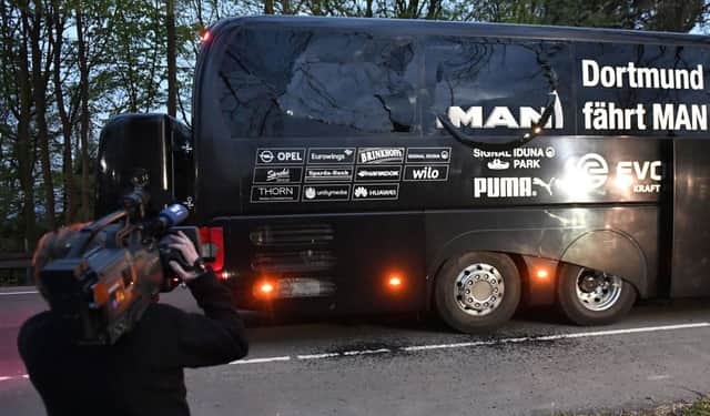 Dortmund's team bus after it was damaged in an explosion before the Champions League quarterfinal soccer match between Borussia Dortmund and AS Monaco
