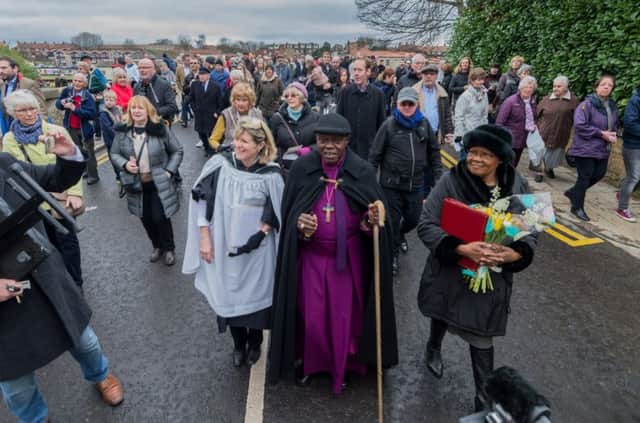 The Archbishop of York, Dr John Sentamu, heading into the centre of Tadcaster after the offical blessing of Tadcaster Bridge.