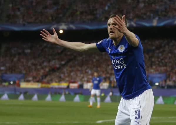 Remonstrating: Leicester Citys Jamie Vardy gestures and appeals to the assistant referee on a night of frustration with the officials for the Premier League champions, who were beaten 1-0 by Atletico Madrid in the first leg of the Champions League quarter-final. (Picture: AP/PAUL WHITE)