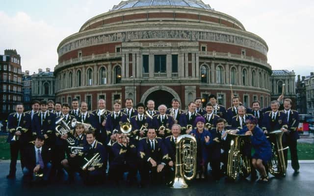 The Grimethorpe Colliery Band and the original cast of Brassed Off outside the Royal Albert Hall where they will now get to play for real.