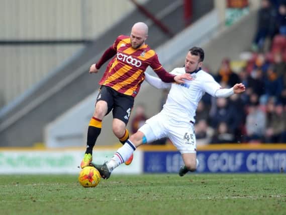 Nicky Law scored the only goal of the game to maintain Bradford's promotion push