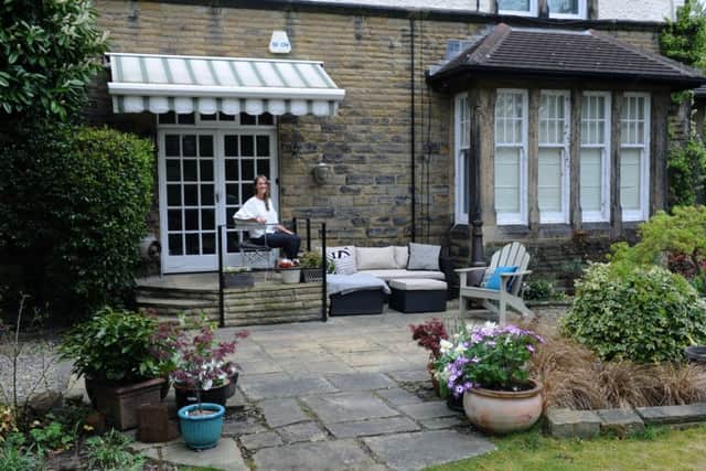 The garden has been overhauled and the exterior of the house spruced up after the apartment owners took control of the management of the building
