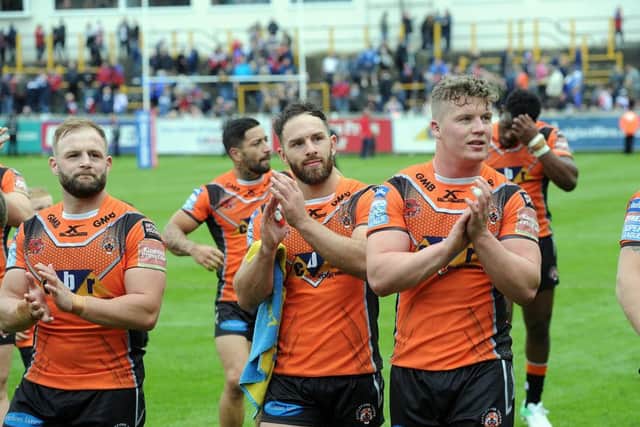 Luke Gale, centre, leads the applause after Castleford beat Wakefield on Good Friday