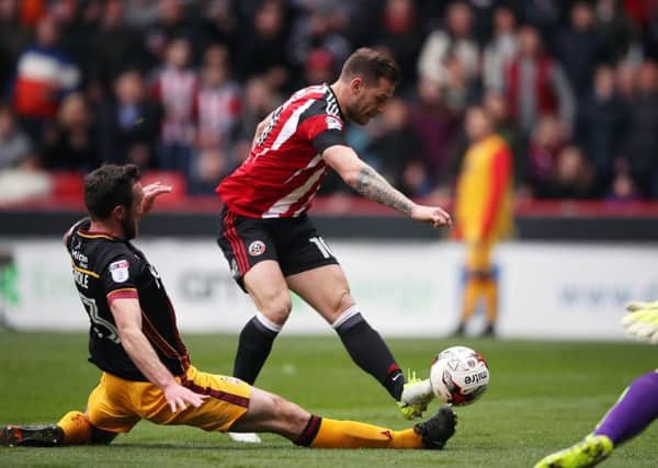 Sheffield United's Billy Sharp scores his side's second goal of the game. Picture: Nick Potts/PA.