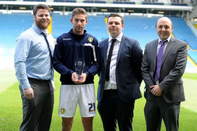 Leeds United's Charlie Taylor was named as the Yorkshire Evening Post player of the year for the 2015/16 season. He is pictured with , from left, Jonny Bage (of the sponsors Jackson Trophies), Max Cocker, (Jackson Trophies), and Phil Hay (Yorkshire Evening Post Chief Sport Reporter).