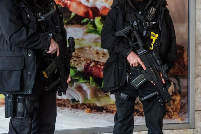 Armed police outside Leeds City Station following the attack on Westminster. Picture: James Hardisty